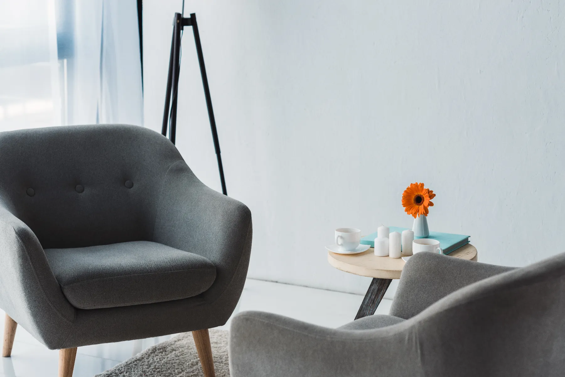 Cozy office in light tones with grey chairs and ta x2